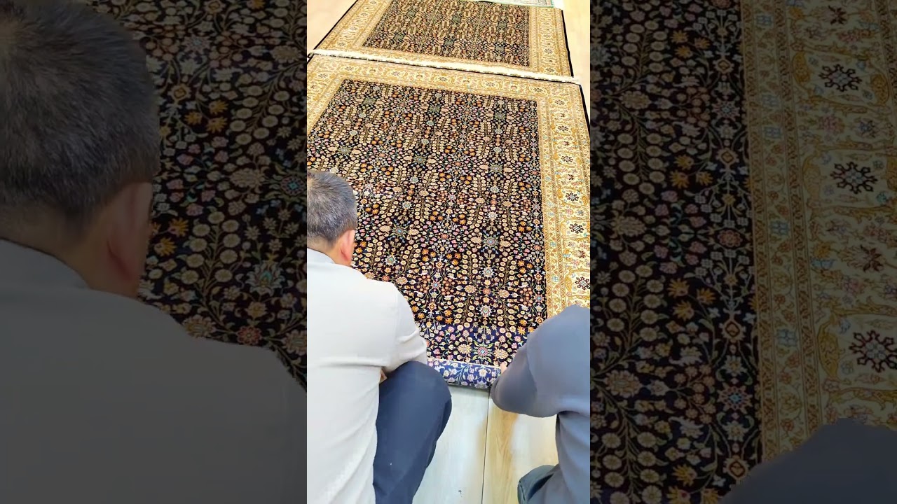 The handmade silk carpet with flower patterns is luxurious and retro.