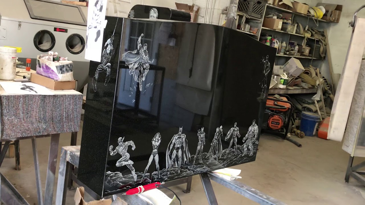 Etched on black polished granite memorial by hand