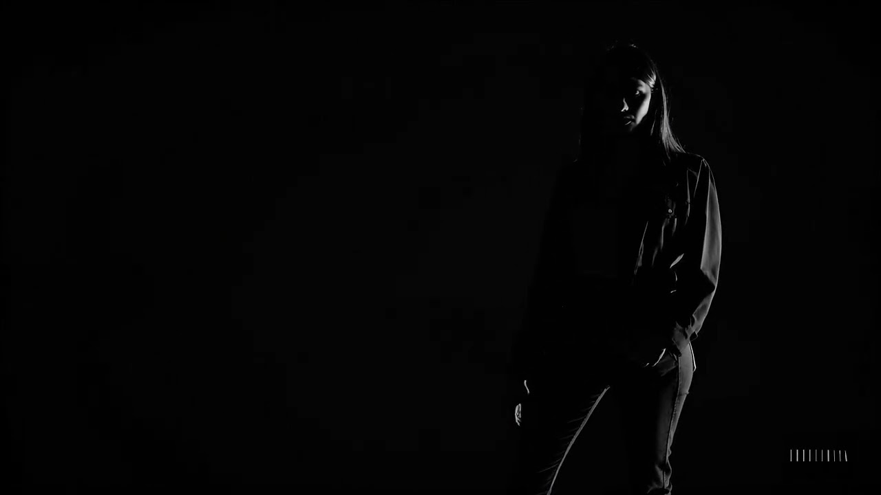Shadowed Elegance: A Womans Poise