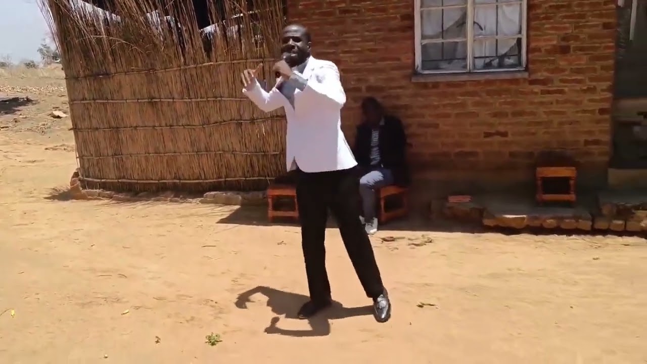 Rev Alexander Kambiri preaching at Mthawira CCAP women guild, Malomo Ntchisi