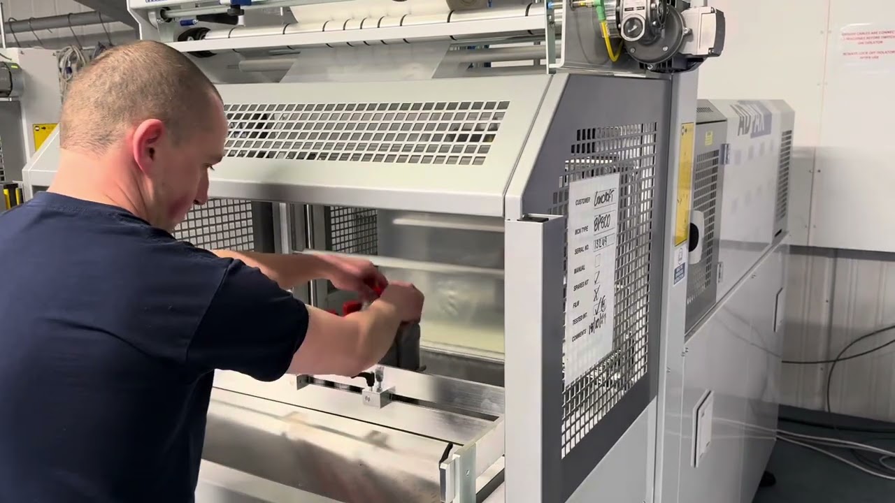 ADPAK SMIPACK BP800 wrapping bottles as a 6 pack