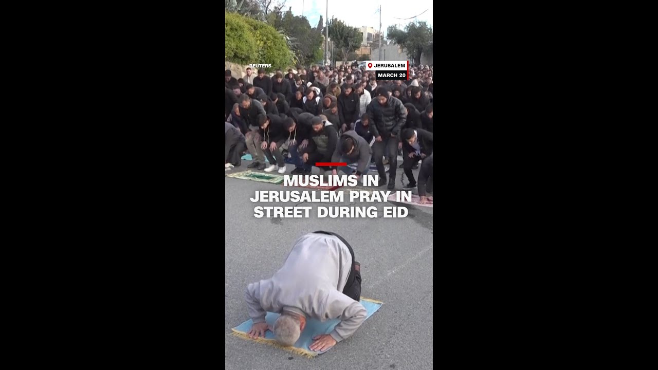 Muslims pray in streets of Jerusalem during Eid