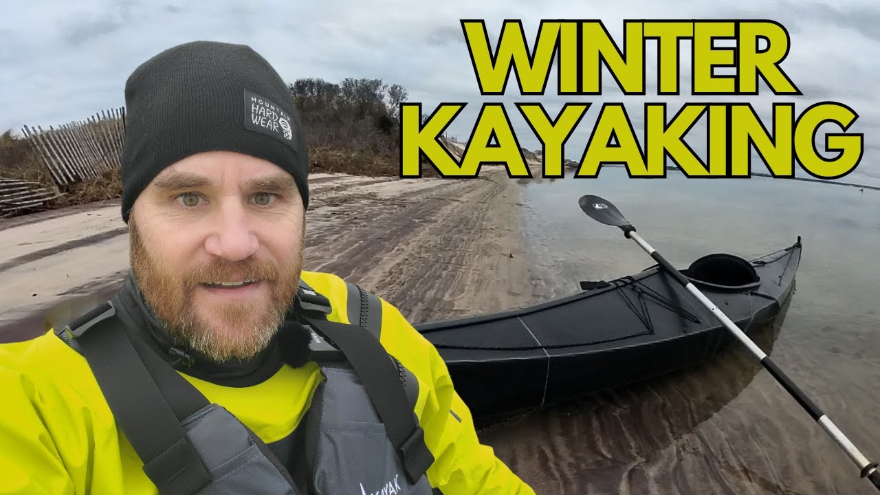 Winter kayaking searching for seals.
