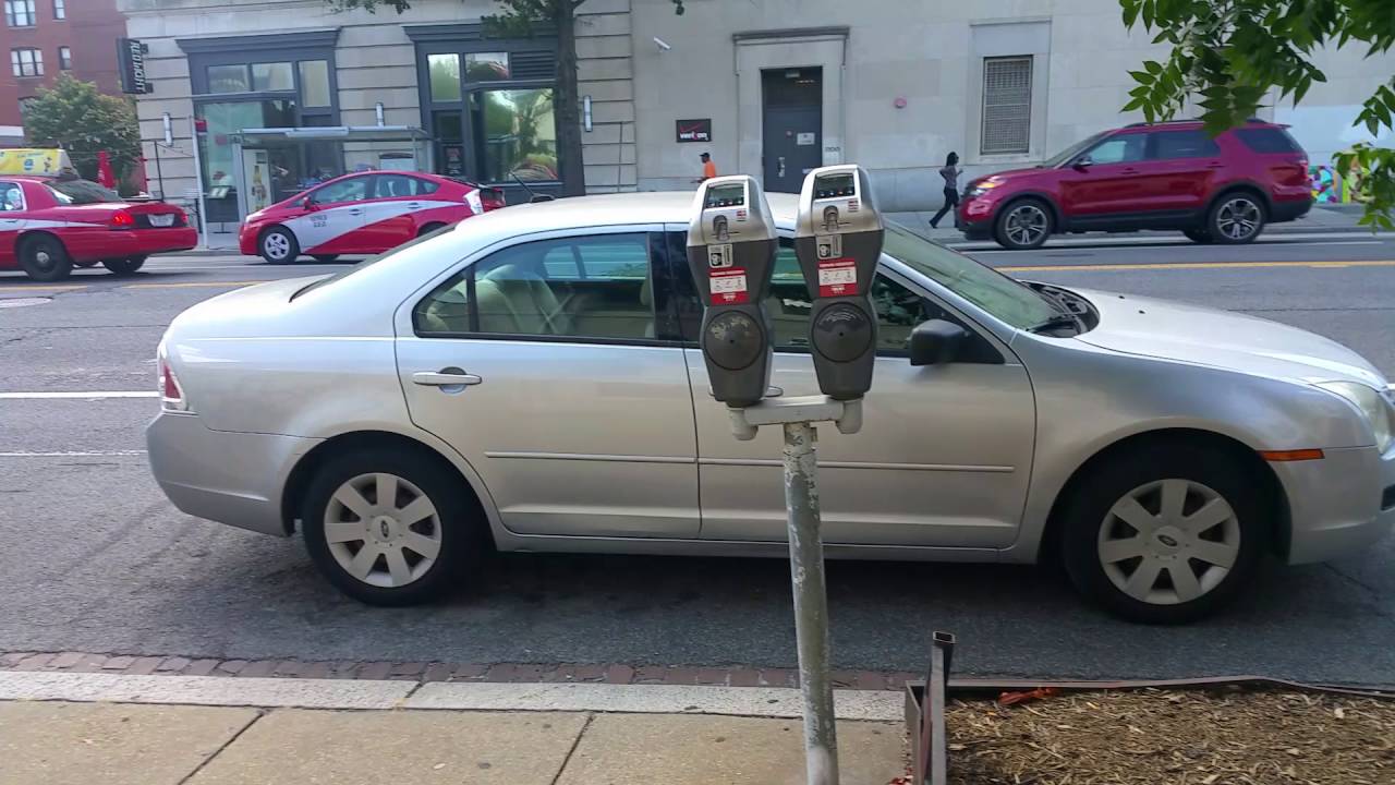 Parking enforcer breaks three violations to give infractions to others' in Washington DC