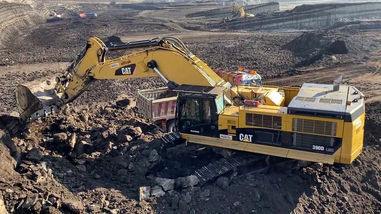 Caterpillar 390D Excavator Loading Trucks With Two Passes - Interkat SA