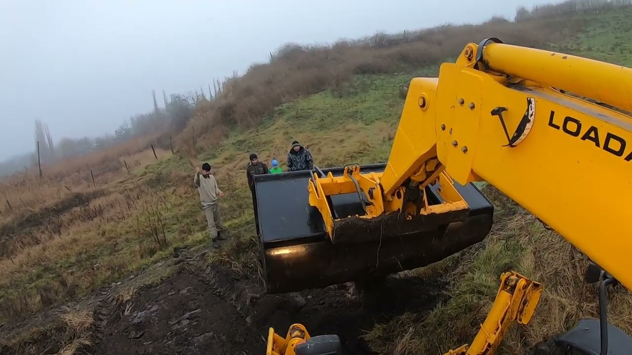 Уборка грунта погрузчиком JCB 535-125