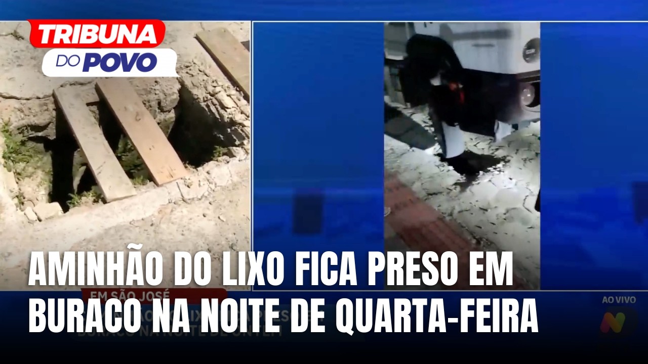 Caminhão de lixo cai em buraco e fica preso em rua de São José