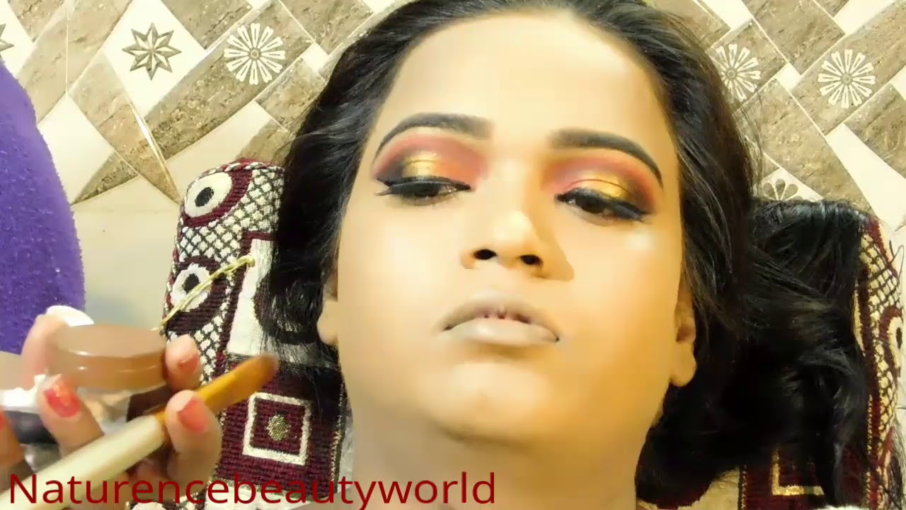 bridal makeup { Red , golden , black eye makeup } ( Hindi )
