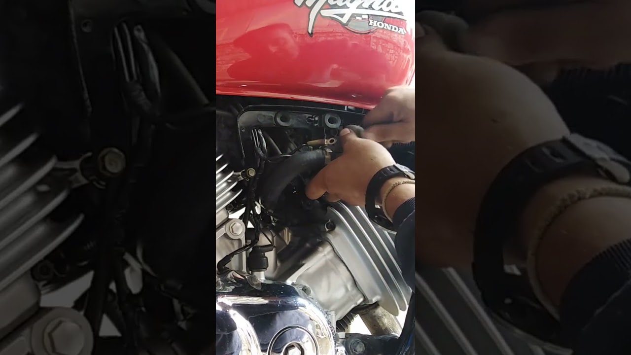 Motorcycle thermostat and fan switch replacement.