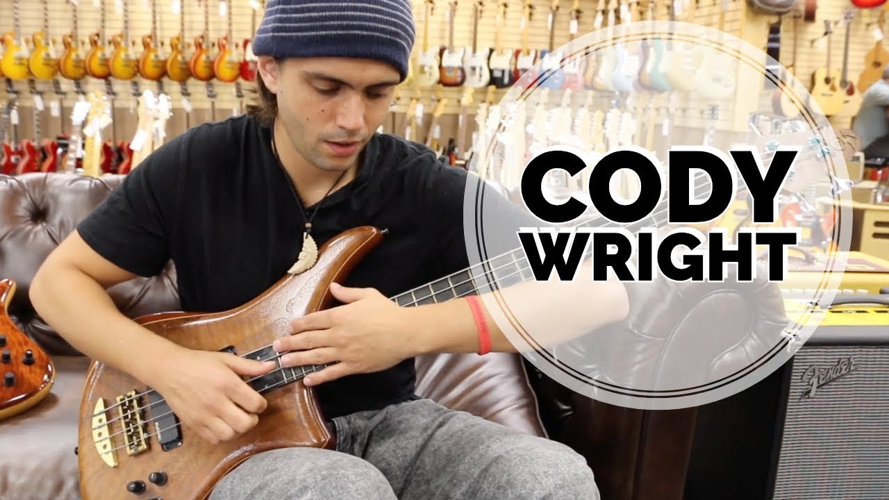 Cody Wright playing a Alembic Bass at Norman's Rare Guitars