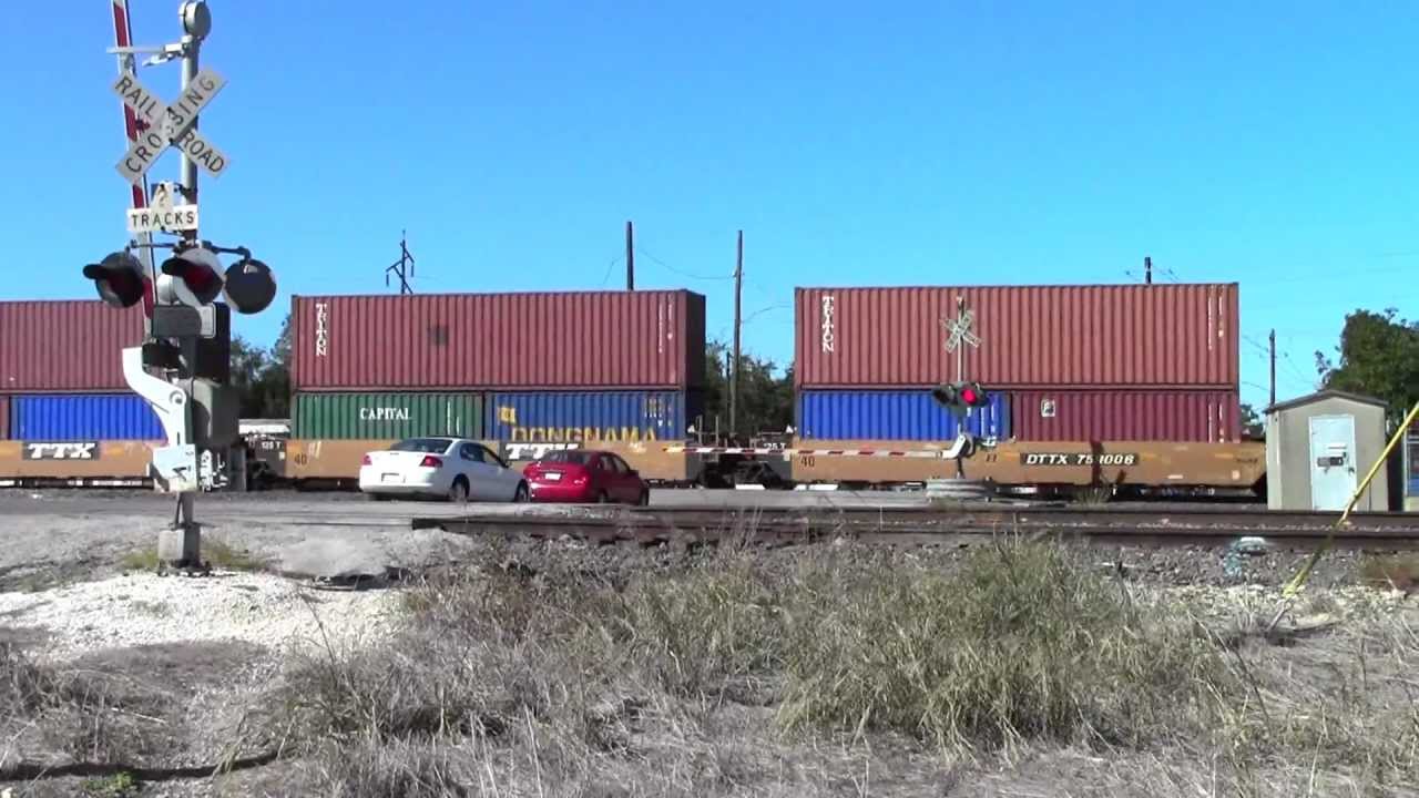 UP 7911 leads eastbound intermodel, Rosenberg, TX