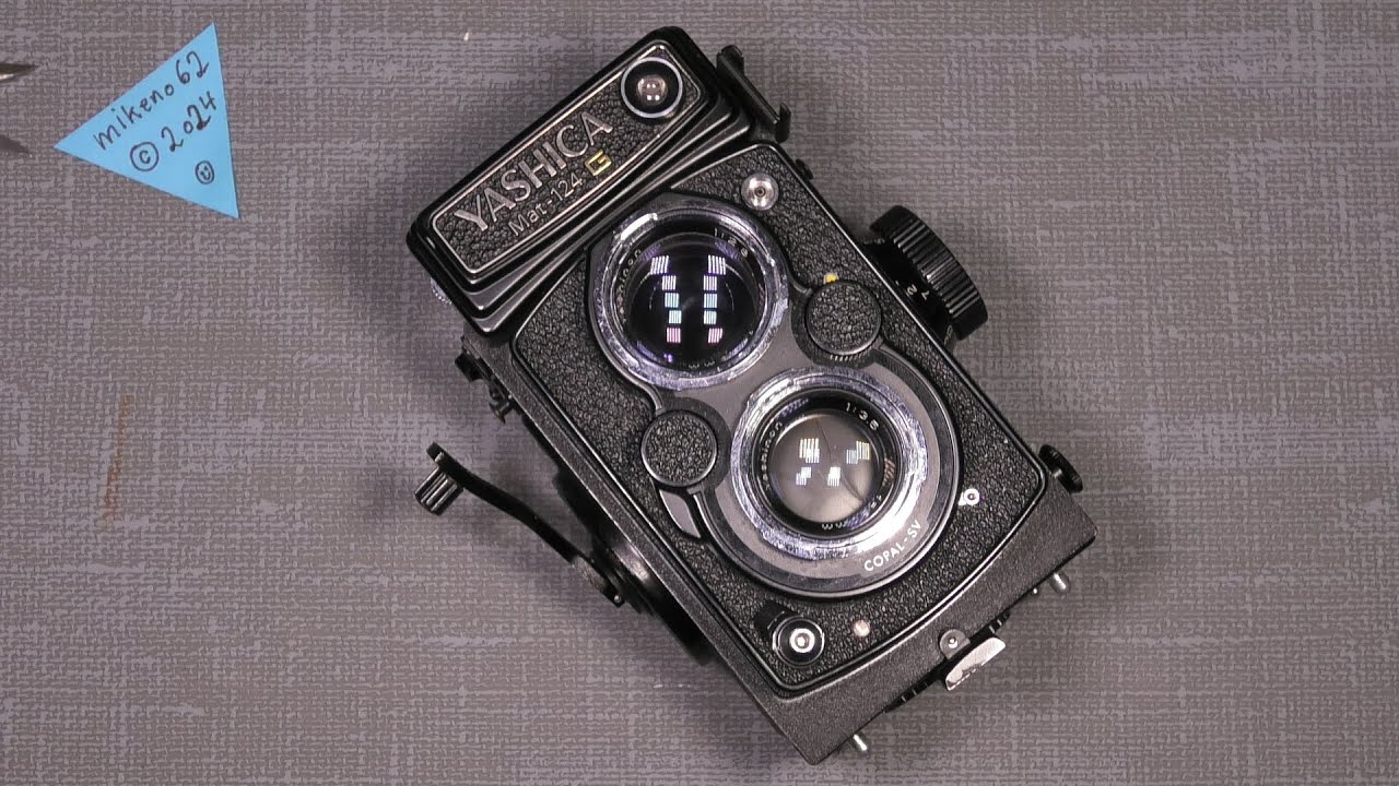 Пыль на линзах объектива Yashica MAT 124 G