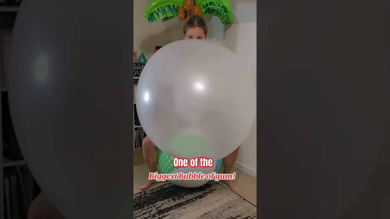 Girl blowing HUGE bubbles. Another short clip of one of the biggest bubbles of gum. 