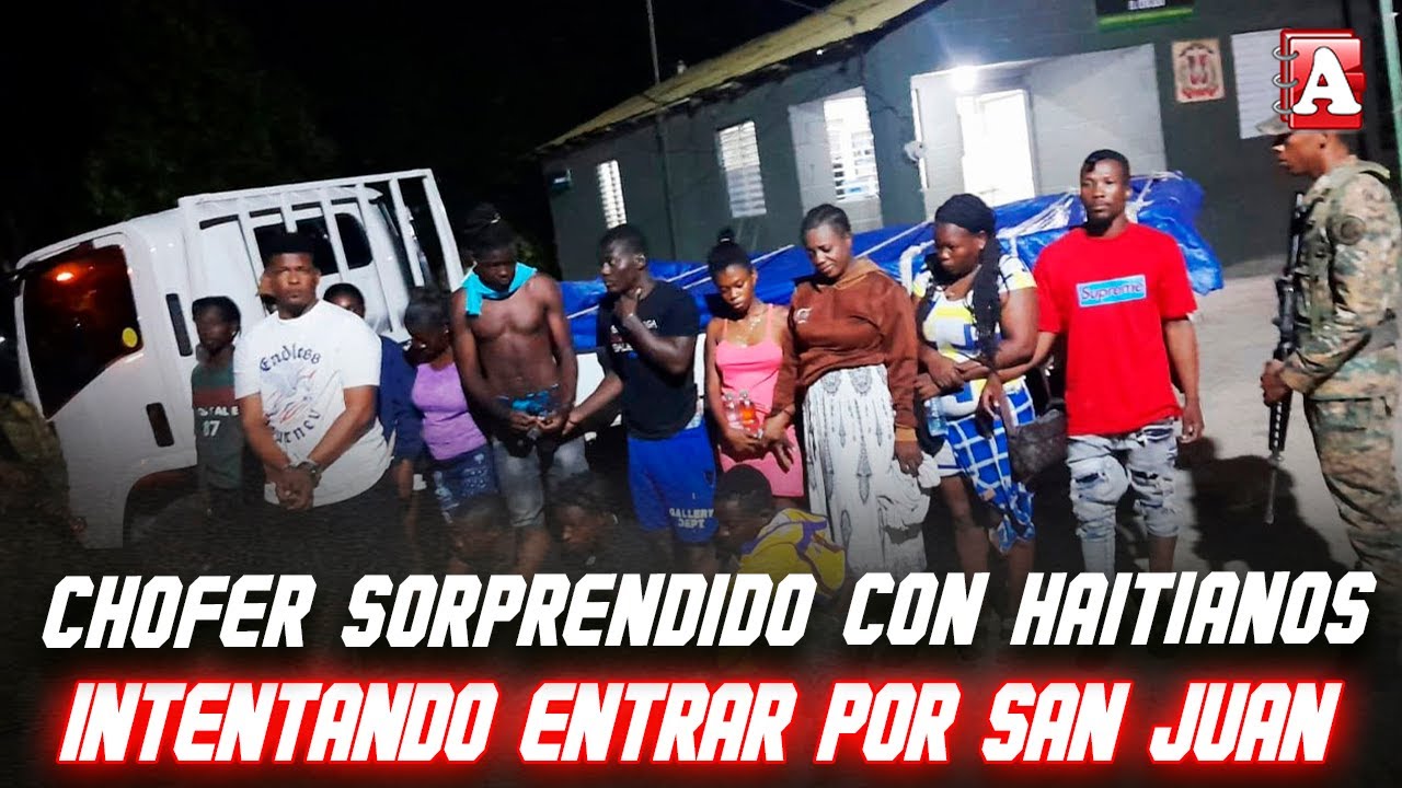 OTRA VEZ GRUPO DE HAITIANOS INTENTANDO ENTRAR EN CAMIÓN EN SAN JUAN