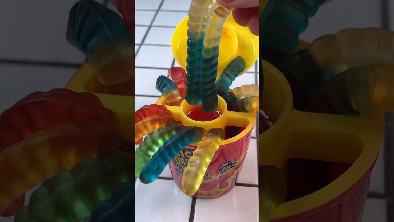 Red juicy drop worms gummy sour jelly food mukbang
