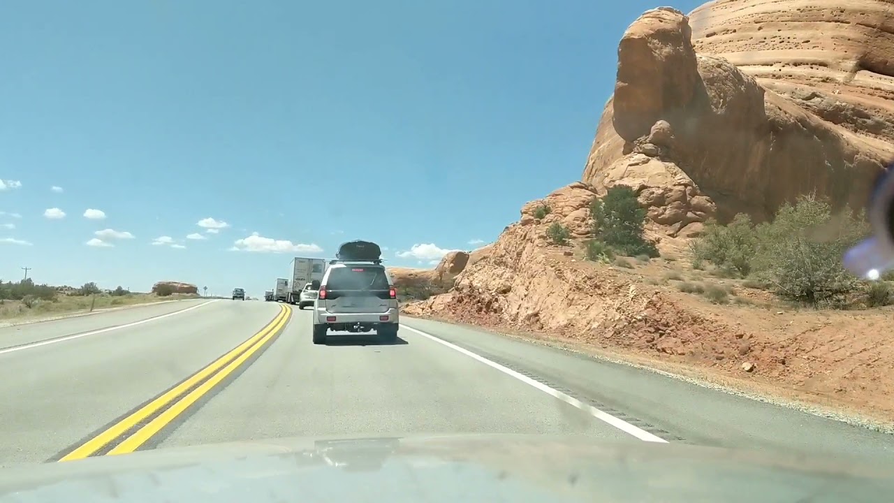 Utah Drive: Rock formations along US Route 191 in a Crown Victoria