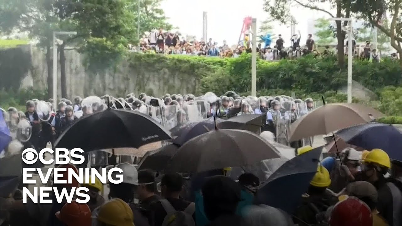 Police fire tear gas at demonstrators in Hong Kong