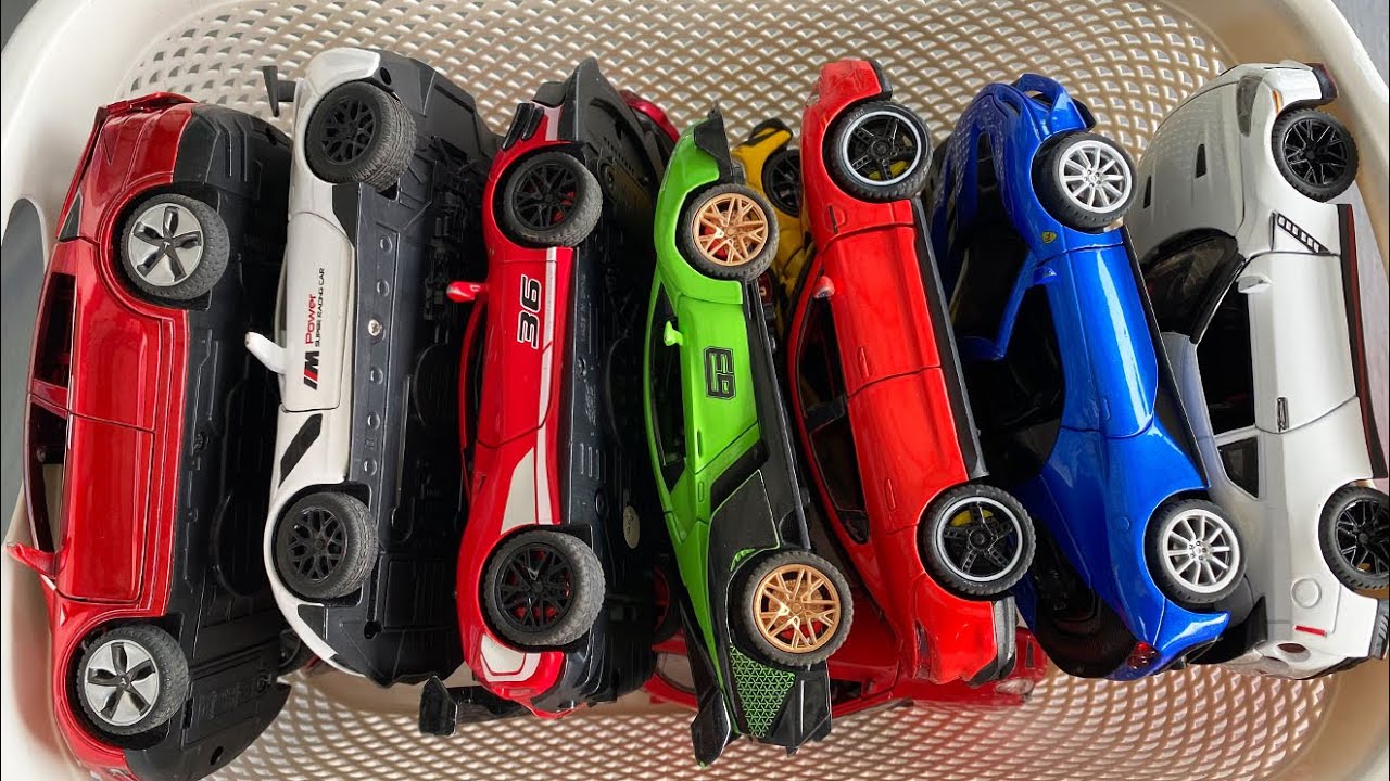 Box full of diecast Cars, Top toy Cars, GTR, Ferrarari, Porsche, Tesla, Dodge