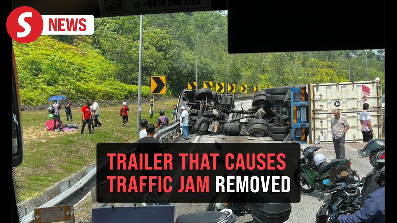 Container truck removed after accident causes hours of traffic snarl
