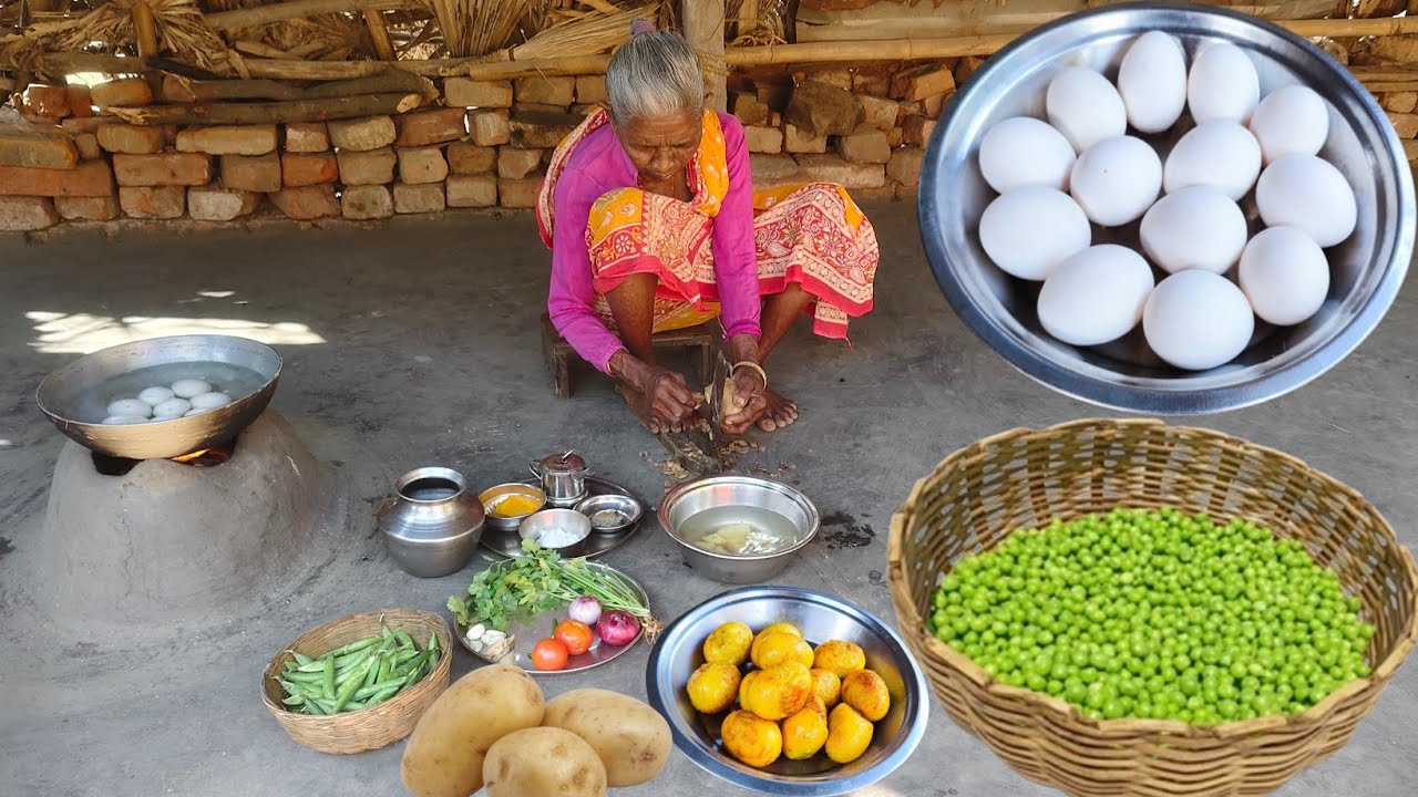 rural tribe old couple cooking EGG CURRY with MOTORSHUTI for lunch. 