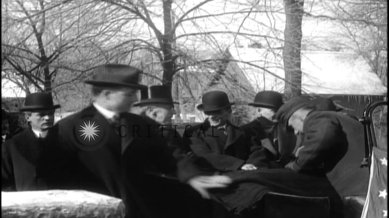 US President Woodrow Wilson enters open car in wintertime, during 1916 Presidenti...HD Stock Footage