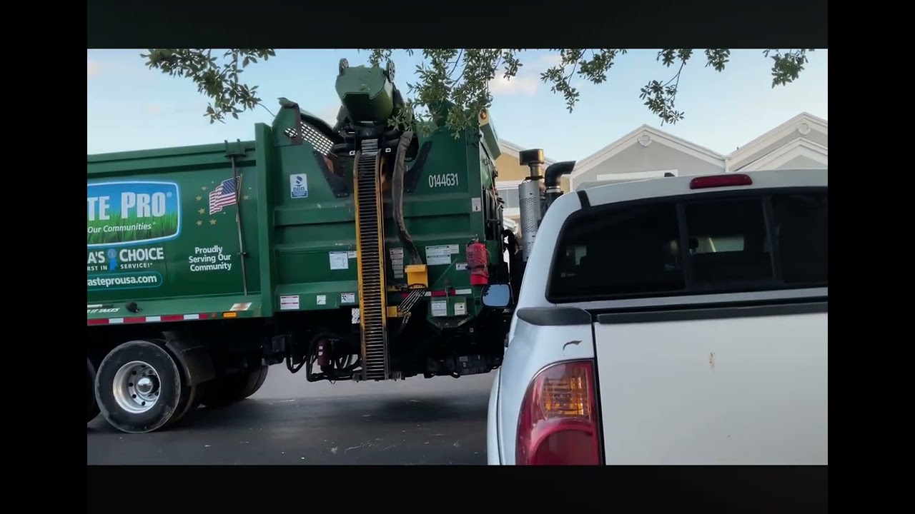 A waste pro ZR Mack LR McNeilus  Zero Radius revving trash