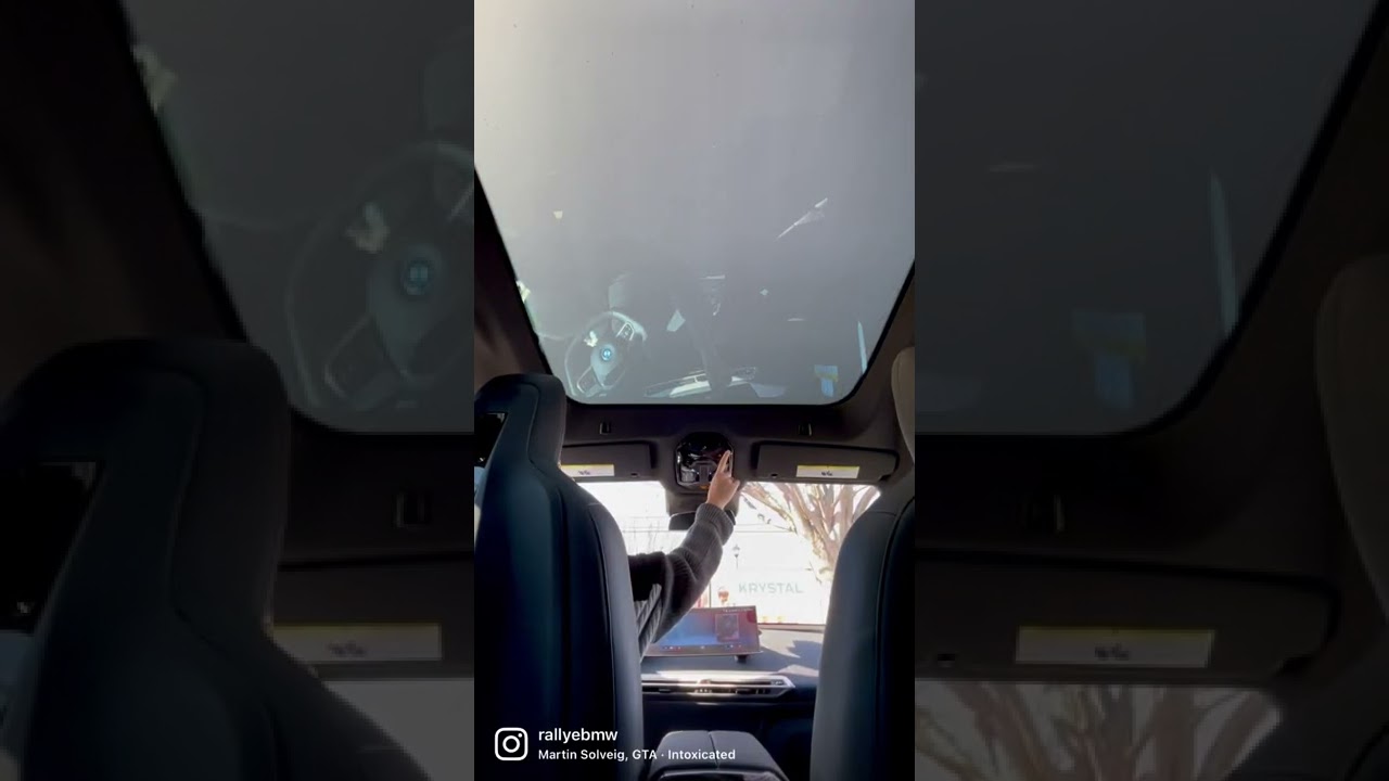 The BMW iX Sky Lounge end-to-end panoramic glass roof has electrochroamatic tinting.