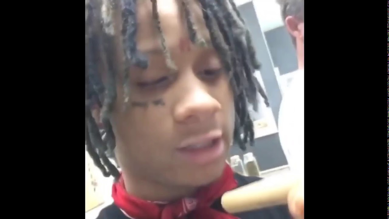 Trippie redd smoking a big blunt