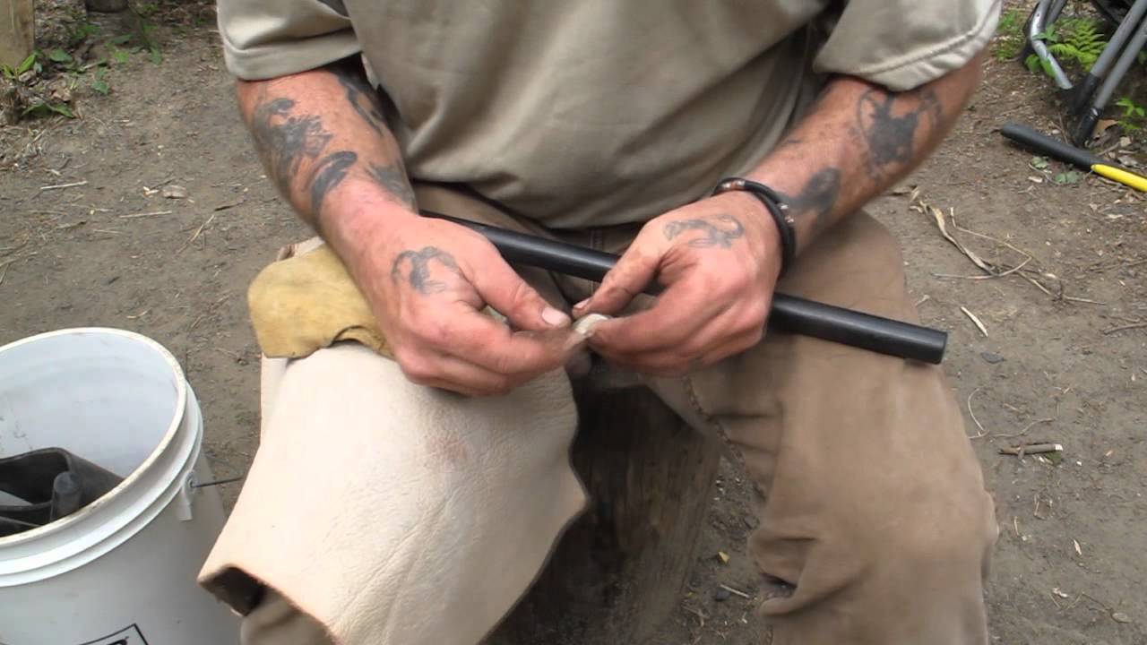 Knapping a Quick Stone Point from a Flake.wmv