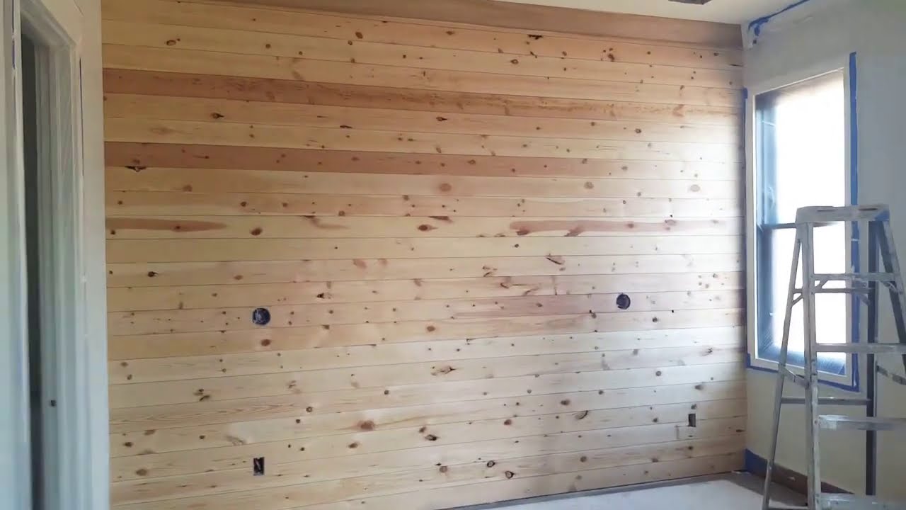 como poner stain a una pared de madera