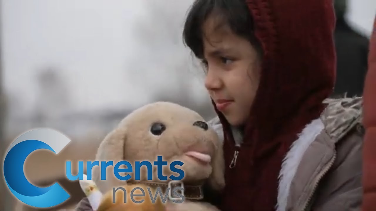 Ukrainian Refugees Flee to Poland as Women and Children Leave Behind Everything