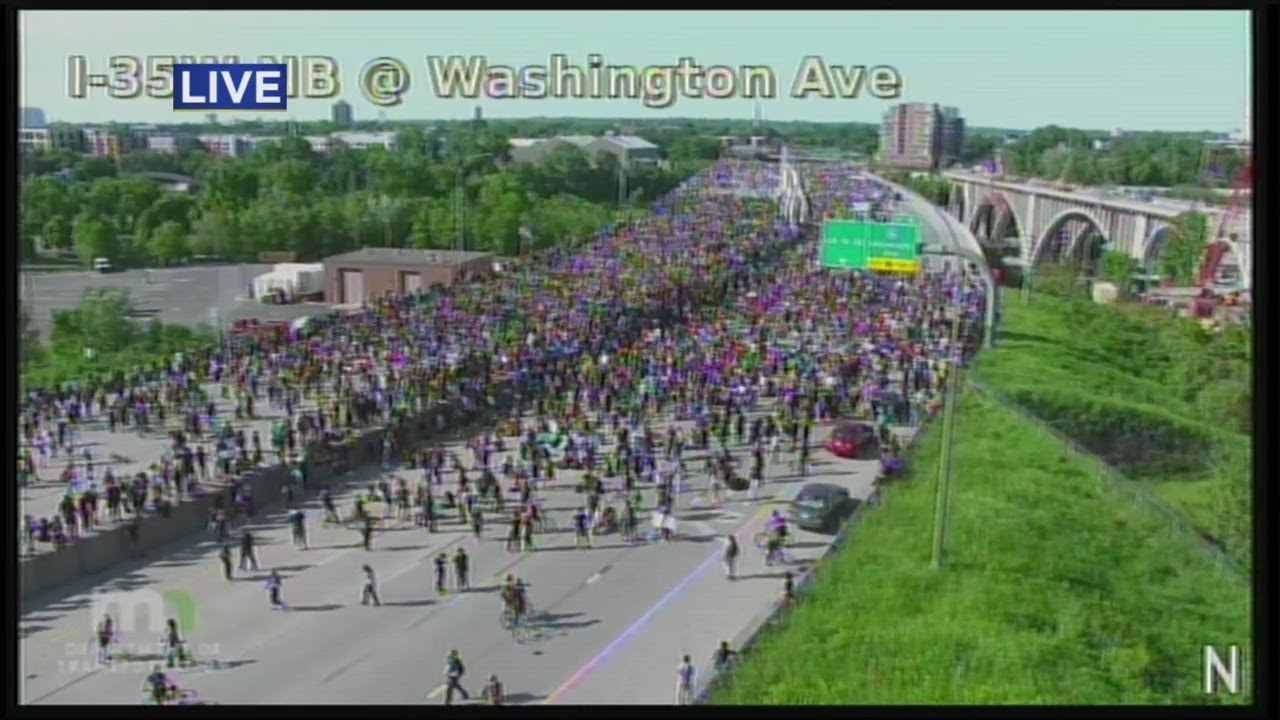 Protesters March Onto I-35W Bridge Over Mississippi River, Spanning Its Width