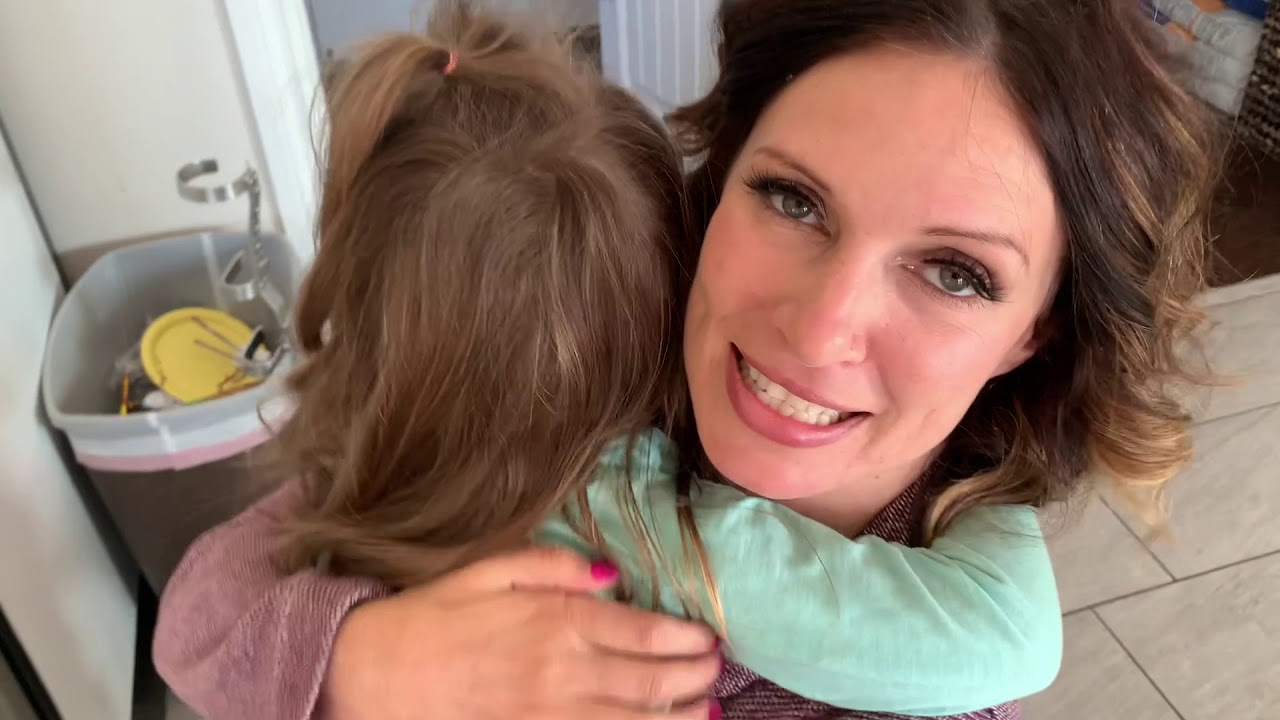 How I push my wheelchair while hugging my daughter