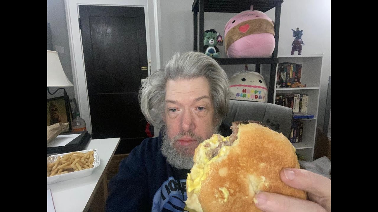 SAD PATHETHIC LONELY HERMITS EATS A CHEESEBURGER BY HIMSELF. NO FRIENDS NO HOPE. ALL IS MEANINGLESS.