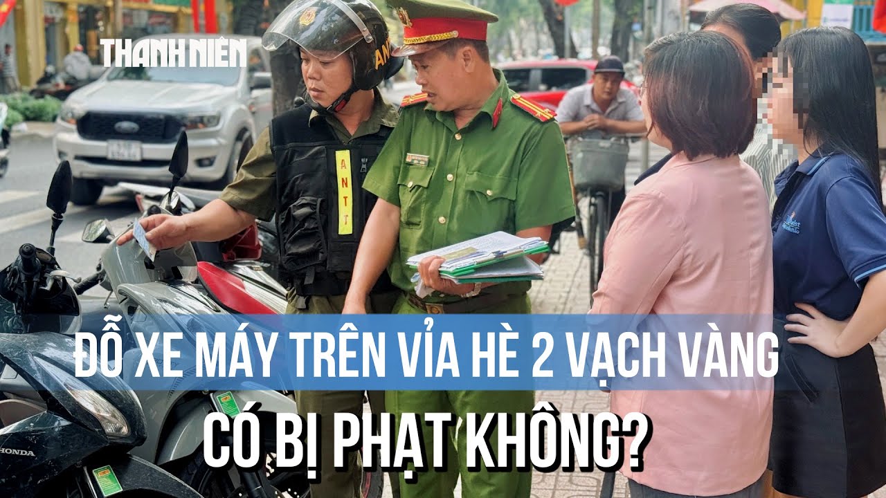 Vỉa hè kẻ 2 vạch vàng ở TP.HCM: Đỗ xe máy có bị phạt không?