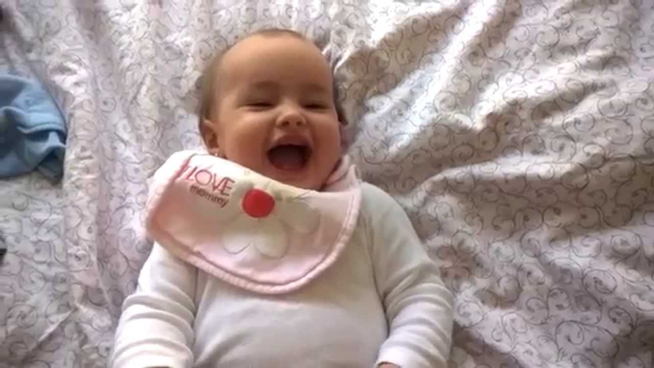 Baby girl laughing while being tickled!