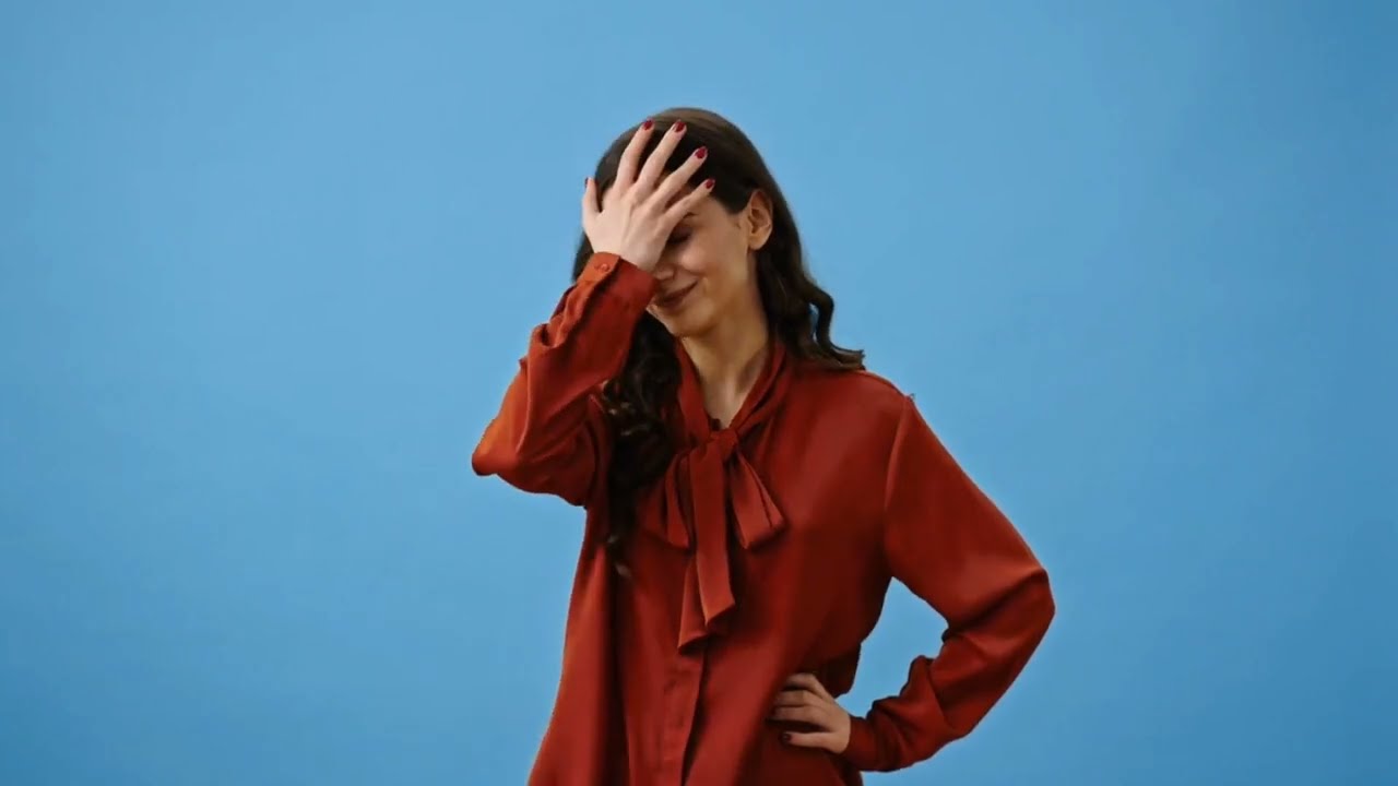 Lady Makes Face Palm Gestures Stock Video | Girl Gives Smile copyright free video | Pixadisc