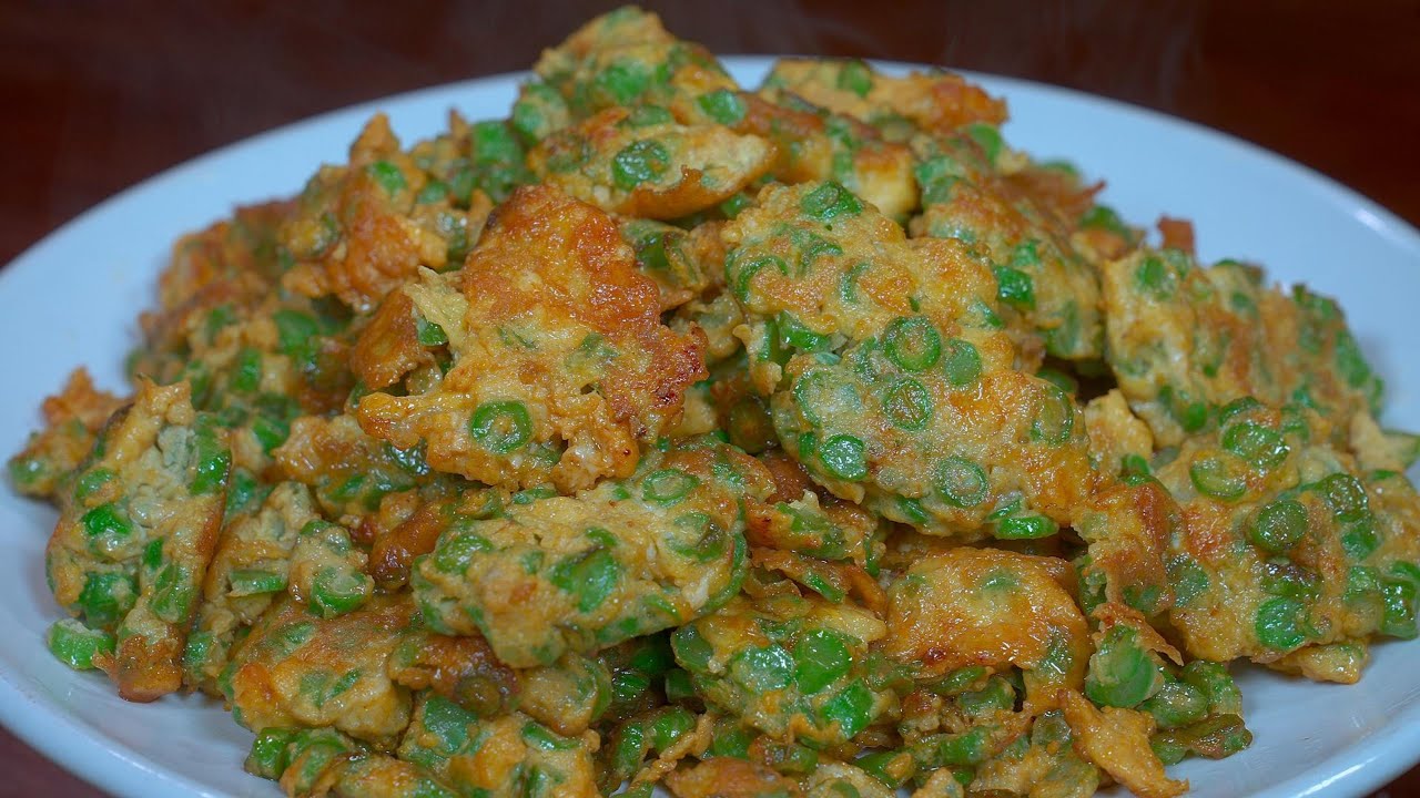 今天用豆角和雞蛋給大家分享壹道美味的家常美食，按照這個方法做出來的豆角炒雞蛋，鮮嫩好吃，鮮香下飯！