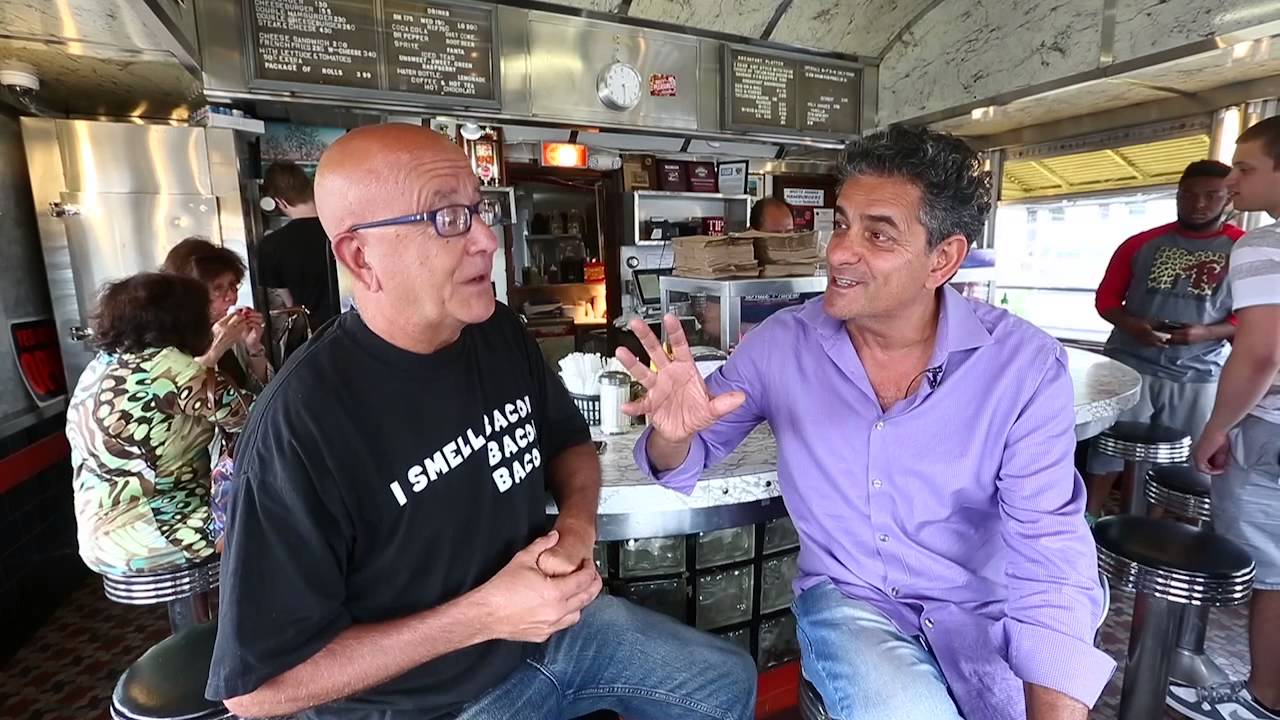 Pete Genovese shoots the breeze with the owner of White Manna Hamburgers
