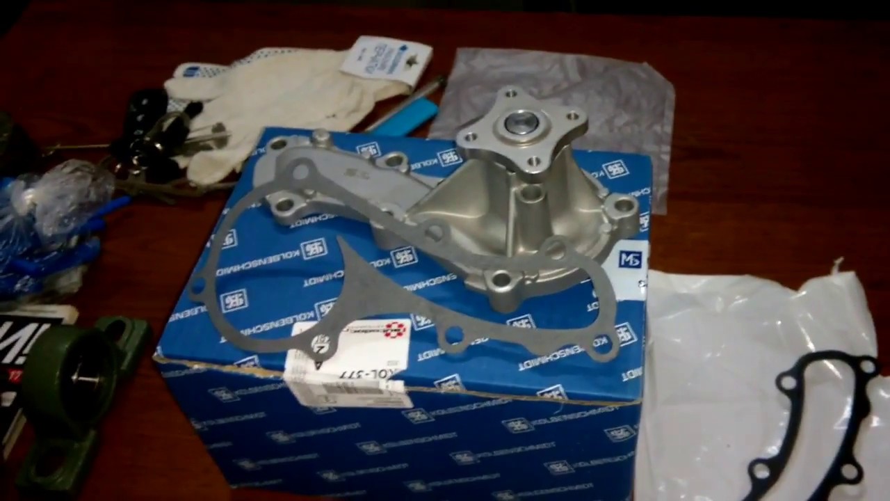 Замена помпы Nissan Almera N16