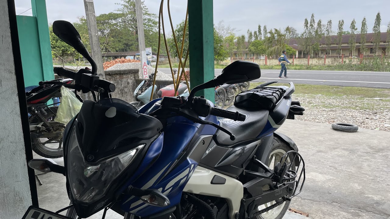 How to stop headlight vibrations in NS 200 ! and how to open  NS 200 headlight