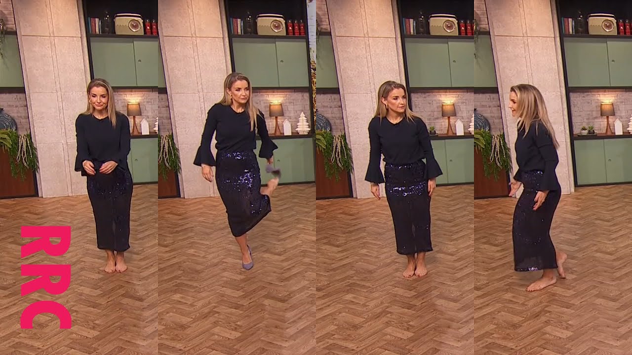 Helen Skelton @pulls shoes off. Half semi-sheer sparkle skirt