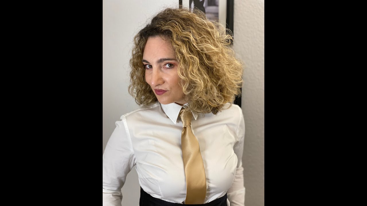 Mrs. Ladybowtie ties a tie. The Prince Albert knot. #tie #princealbert #MrsLadybowtie #bosslady