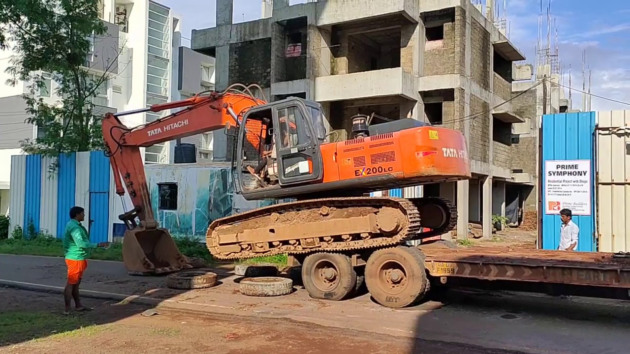 How to Load Tata Hitachi on a Trailer Truck