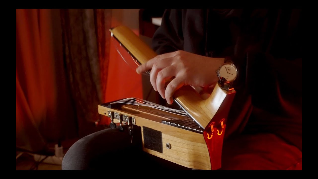 The smallest folding travel guitar!