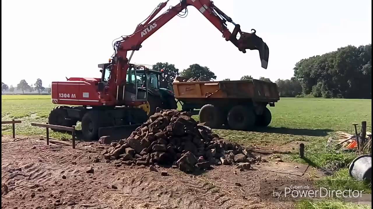 Puin wegbrengen en uitgraven met de Atlas kraan