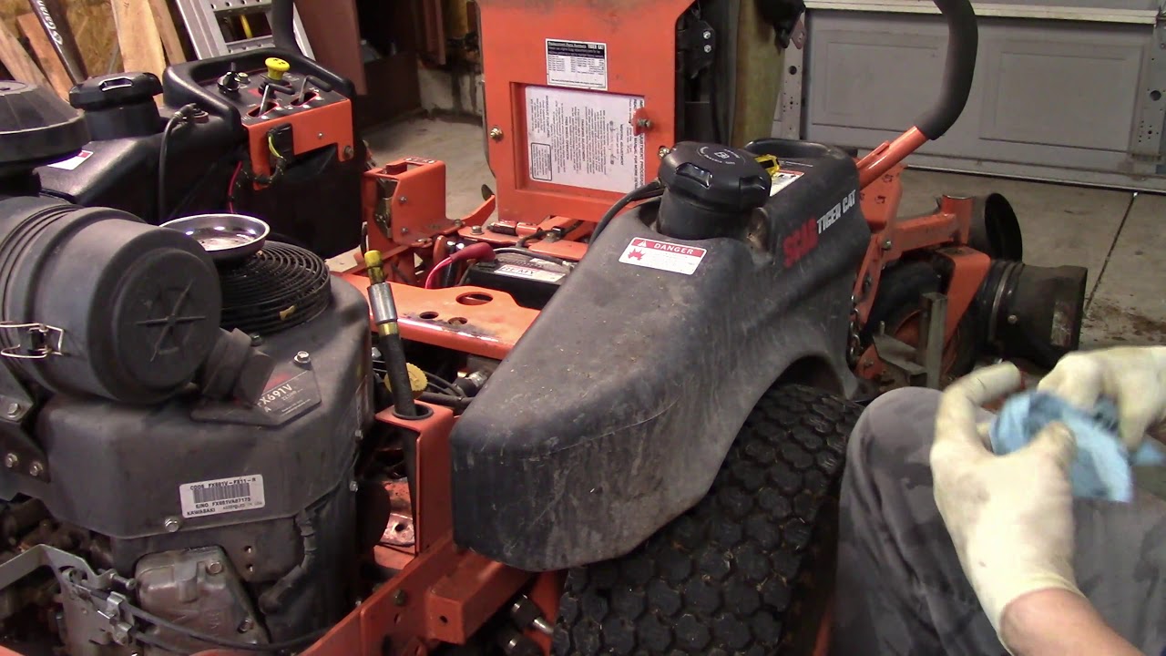 Maintanence on the Scag Tiger Cat