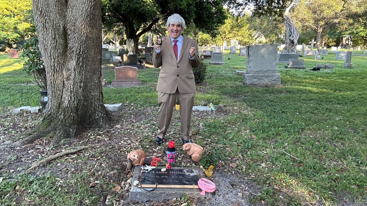 My Frank Drebin Cosplay at Leslie Nielsen's Grave on Halloween with Naked Gun Beaver Popcorn Bucket!