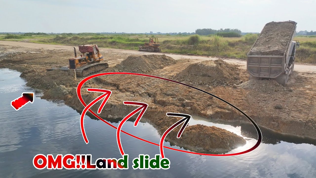 Land slide Amazing Bulldozer KOMATSU D53 And 25T Dump Trucks Loading Soil Filling The Lake