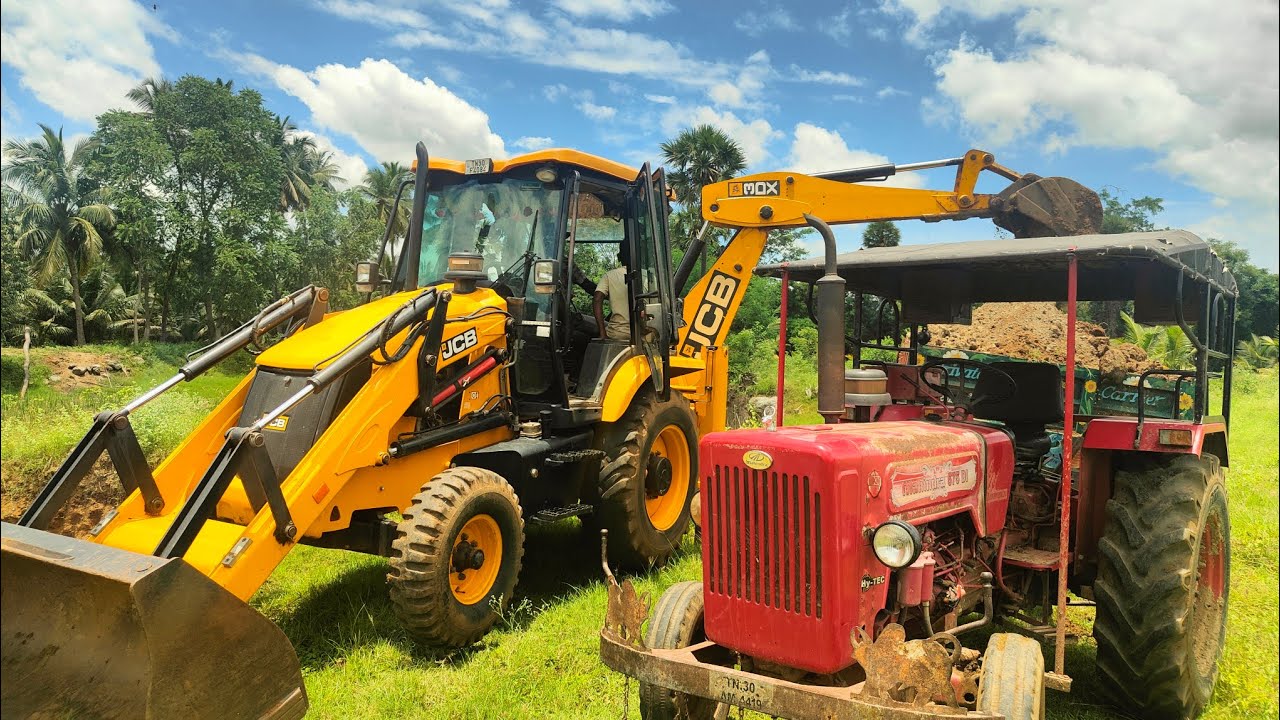 jcb 3dx backhoe goes to loading dung and soil with Mahindra 415 and Mahindra 575 tractors